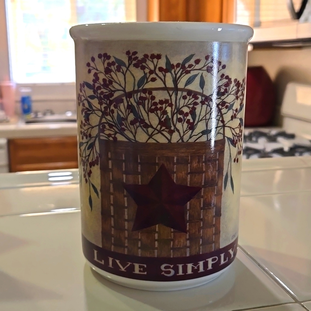 Live Simply Utensil Crock. The colors are Tan and Maroon
